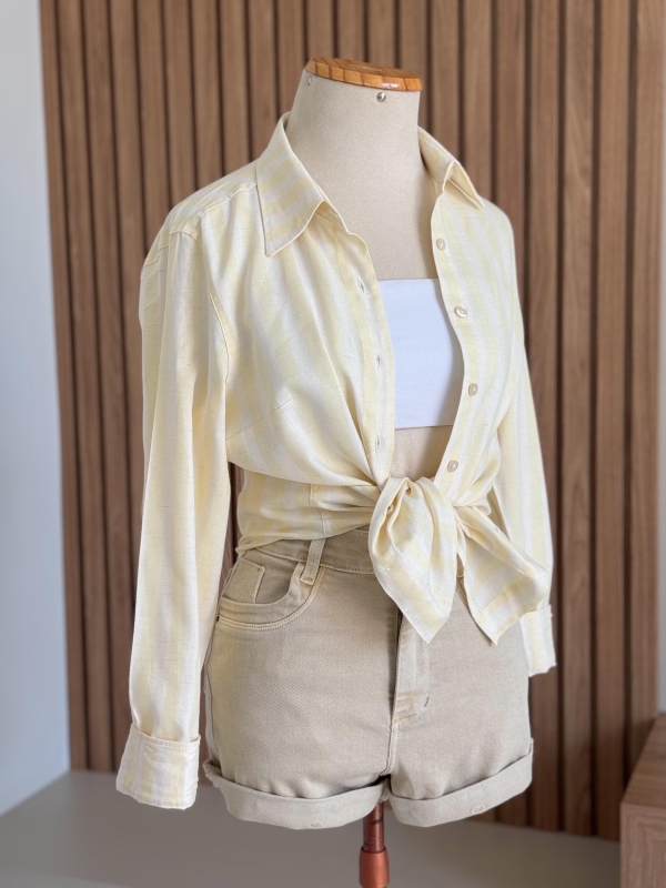 Max camisa listrada.